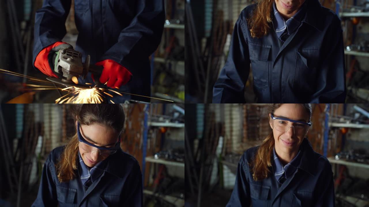 年轻的女机械师，穿着工作服，戴着护目镜，在她的车间里微笑着看着相机。专业焊工使用角磨床打磨金属火花飞