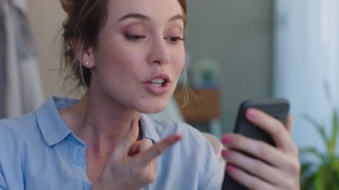 美丽的聋哑女人使用智能手机视频聊天手语与手势享受在线交流