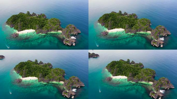 卡拉莫恩群岛，Camarines Sur，Matukad，菲律宾。有白色沙滩的岩石岛。