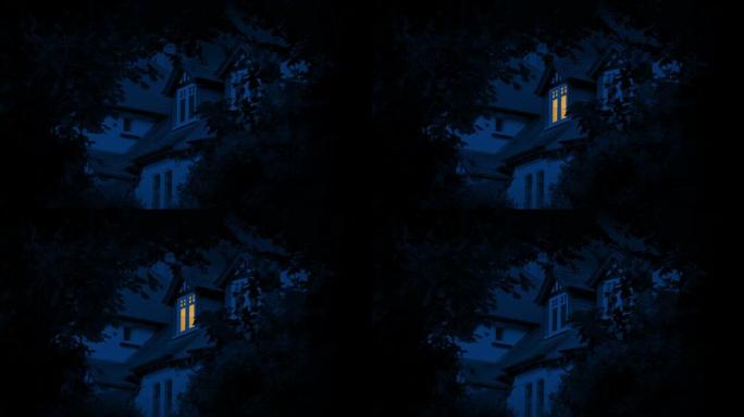 晚上在被树木框起来的房子里开灯和关灯