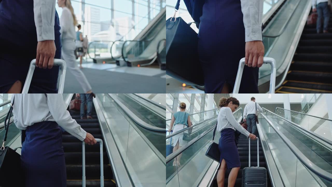 女商务旅行者拎着手推车走在机场上电梯，女高管出国出差，用4k智能手机查看信息