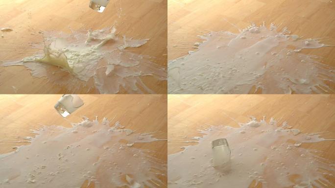 滴牛奶并在地板上摔碎，慢动作