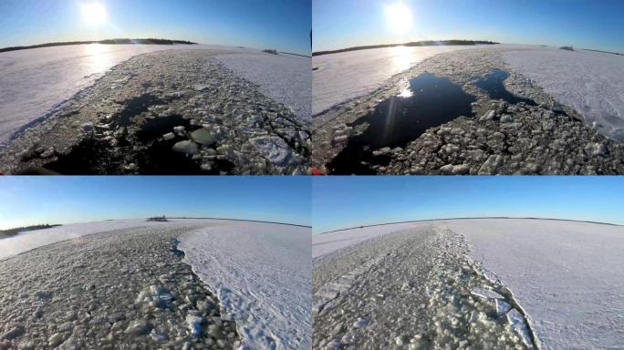 芬兰拉普兰的破冰船穿过厚厚的冰海。高角度