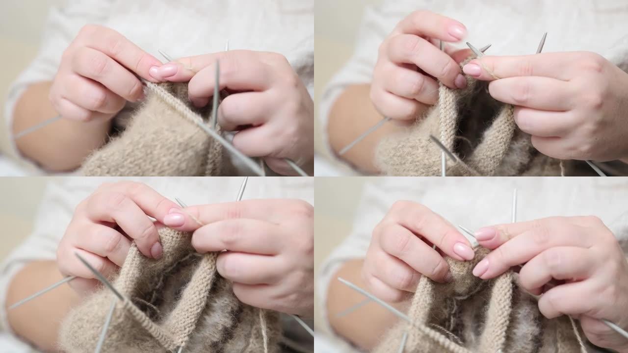 羊毛纱线手工编织。用狗毛纱线制作袜子。