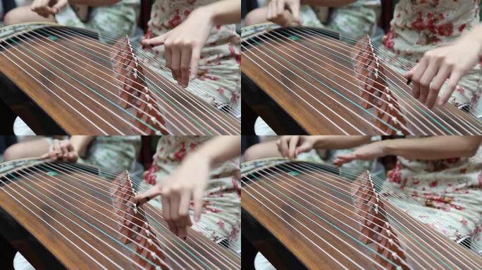 中国女孩演奏民族乐器-古筝