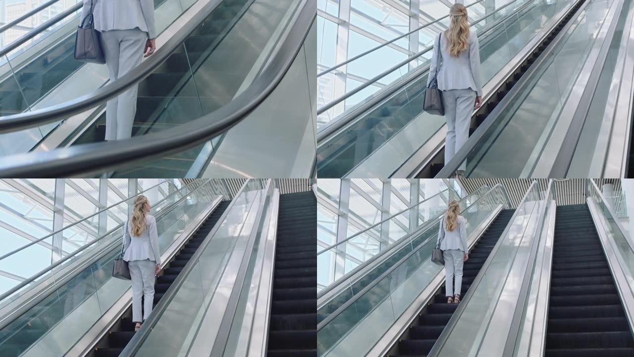 商务女性在自动扶梯上上班，在机场候机楼大堂上班，公司阶梯概念