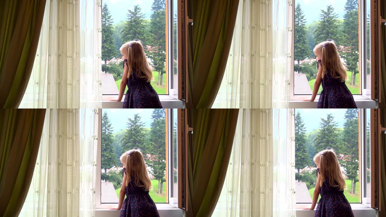 悲伤孤独的孩子看着窗外的玻璃，沉思无聊的女孩