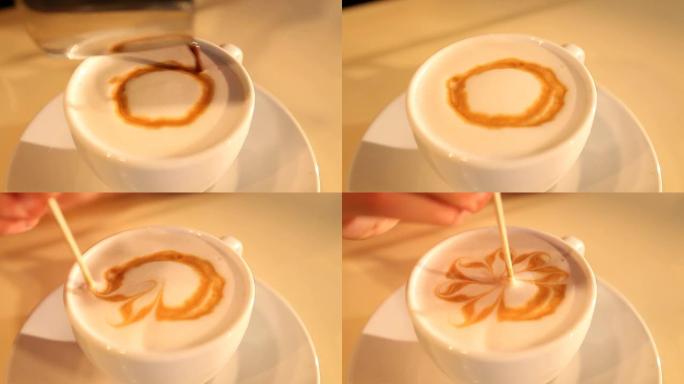 咖啡师用咖啡在牛奶上画画
