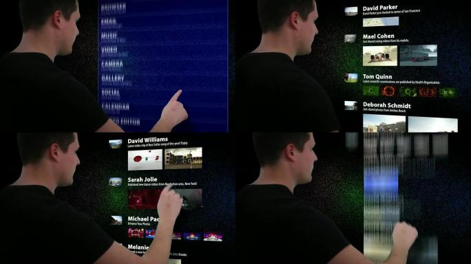 年轻人使用未来派触摸屏电脑检查社交媒体