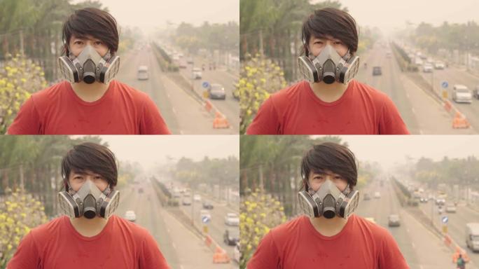 戴着污染面具的亚洲男子对下午在户外天空2.5空气污染下缓慢摇头感到失望