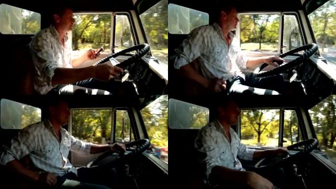 卡车司机在驾驶室使用手机