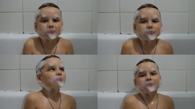 可爱的宝宝沉迷于沐浴泡沫。孩子的整个脸都被泡沫覆盖。这个男孩在浴缸里泡澡打扮。泡沫儿童的概念。