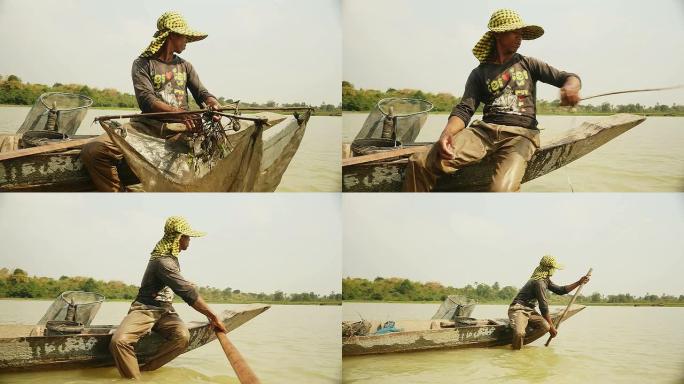 虾渔夫诱饵网的关闭，将其放到更深处的河中，划船以获取新的渔获物