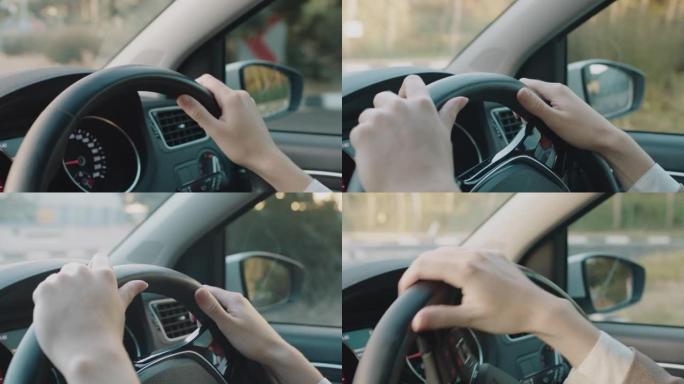 女人用手在方向盘上驾驶汽车来控制城市中的车辆在高峰时间行驶到目的地的道路上
