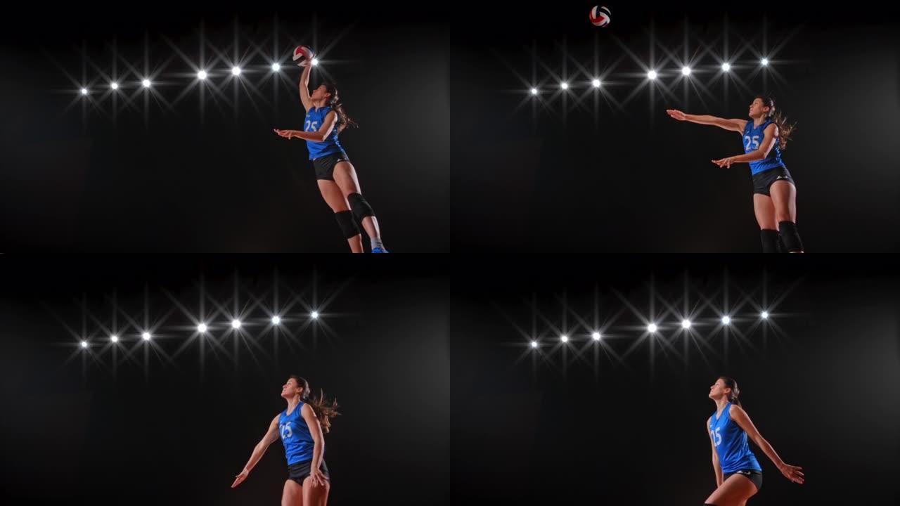 穿着蓝色球衣的SLO MO SPEED坡道女子排球运动员在空中高高击球