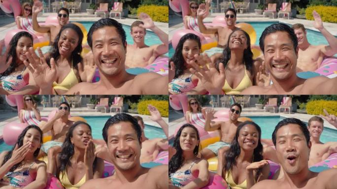 游泳池里的朋友年轻的亚洲男子用智能手机拍摄视频在社交媒体上分享暑假快乐的人在户外享受夏日4k