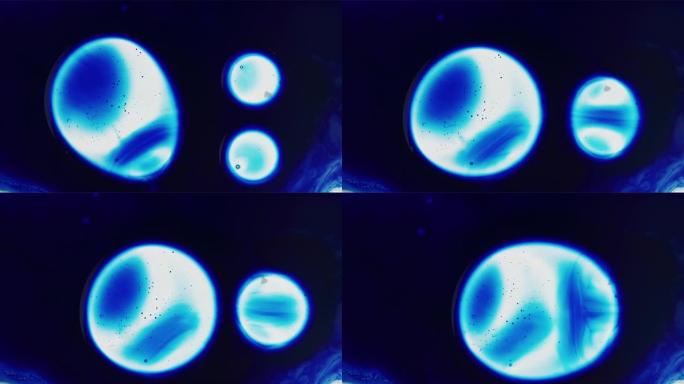 蓝色液滴漂浮在空间中进行有丝分裂背景