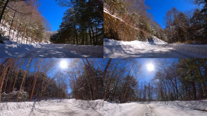 冬季在多雪山区的森林道路上行驶