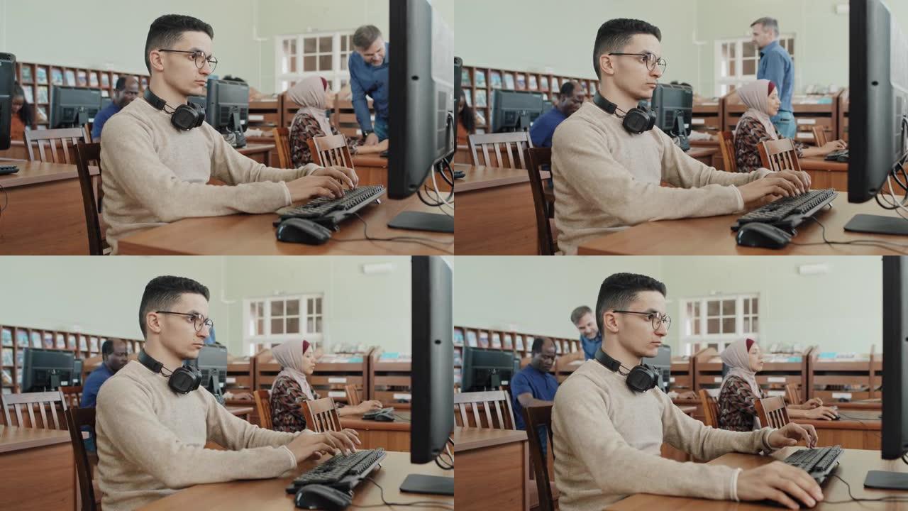 在计算机上工作的中东学生