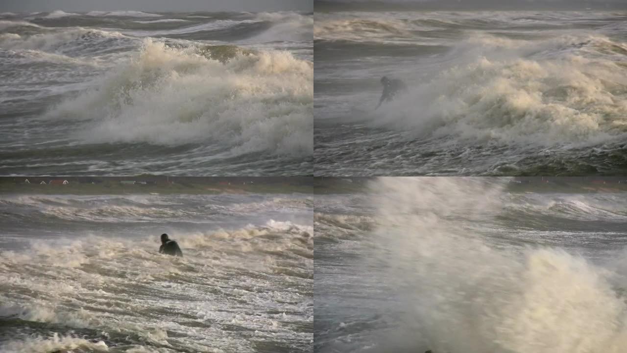 冲浪者试图赶上海浪。极端天气
