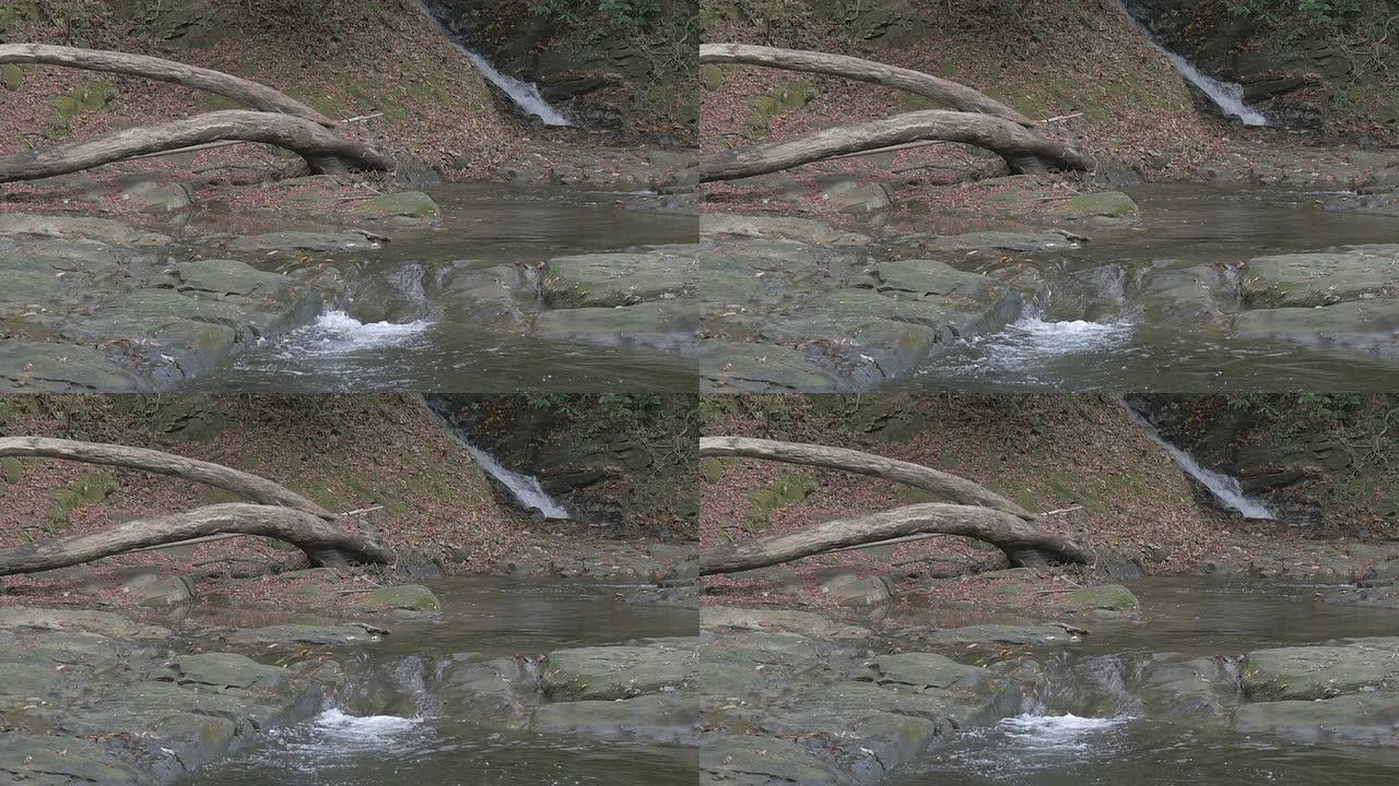 瀑布周围行动的慢动作视图。