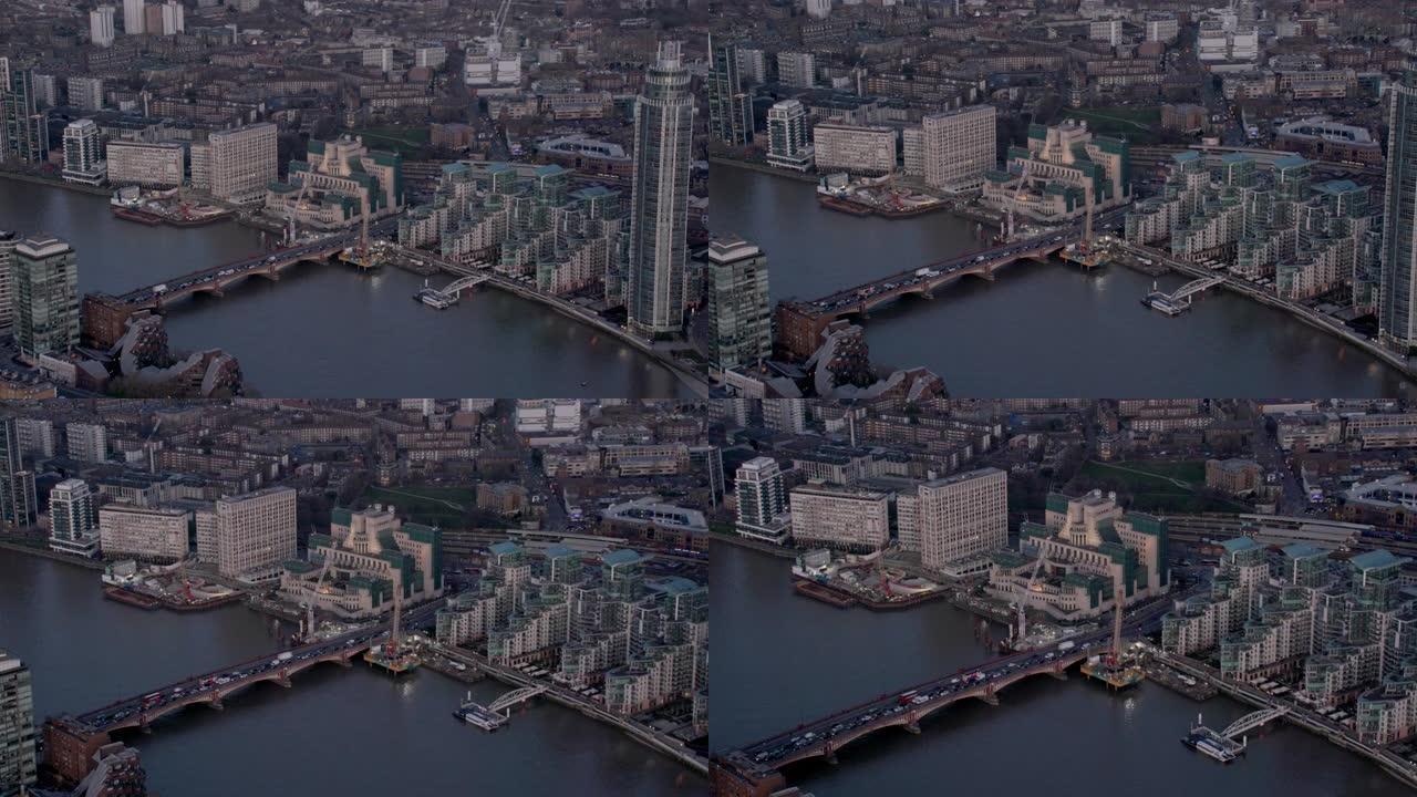 英国伦敦，军情六处大楼、沃克斯豪尔桥和泰晤士河的鸟瞰图。4 k