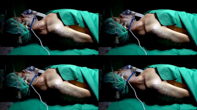 4K，病人躺在手术床上穿着手术服等待手术，鼻子和嘴巴上戴着氧气面罩，病人身体状况不佳，一直有抽搐和抽