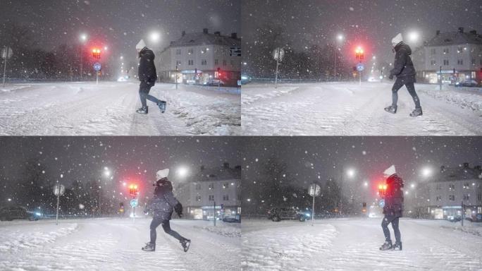 女人在暴风雪中过马路