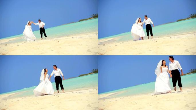快乐的婚礼情侣在海洋中跳舞