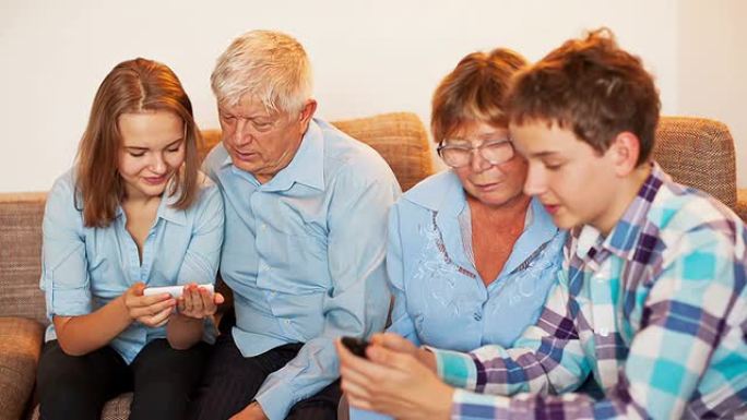 青少年和老年人学习智能手机