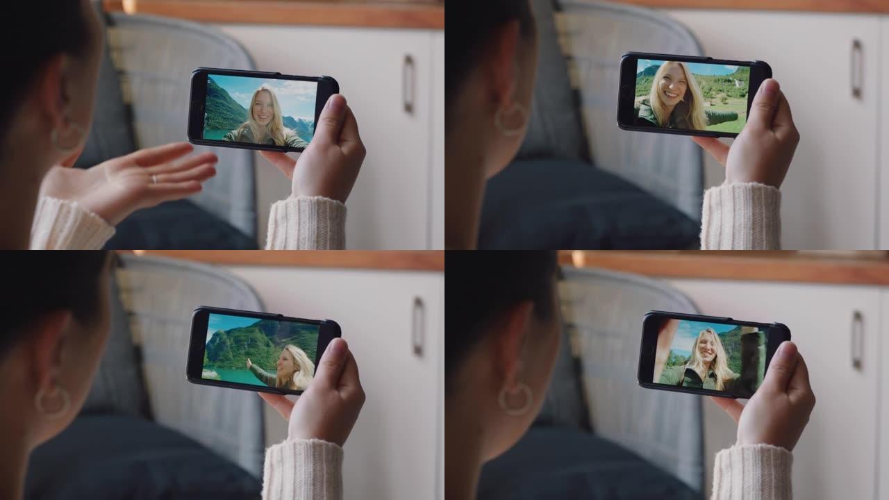 年轻女子视频聊天使用智能手机快乐的朋友在挪威度假分享旅游体验享受假期冒险与手机交流