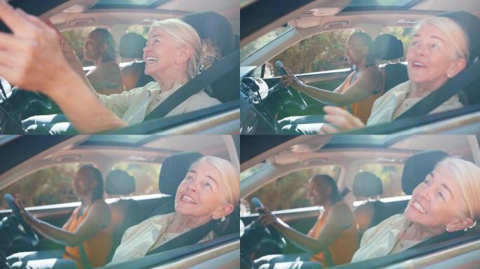 两位年长的女性朋友享受一日游，一起开车观光