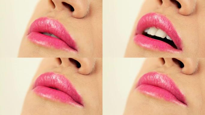 粉红色光泽的性感女性嘴唇，特写