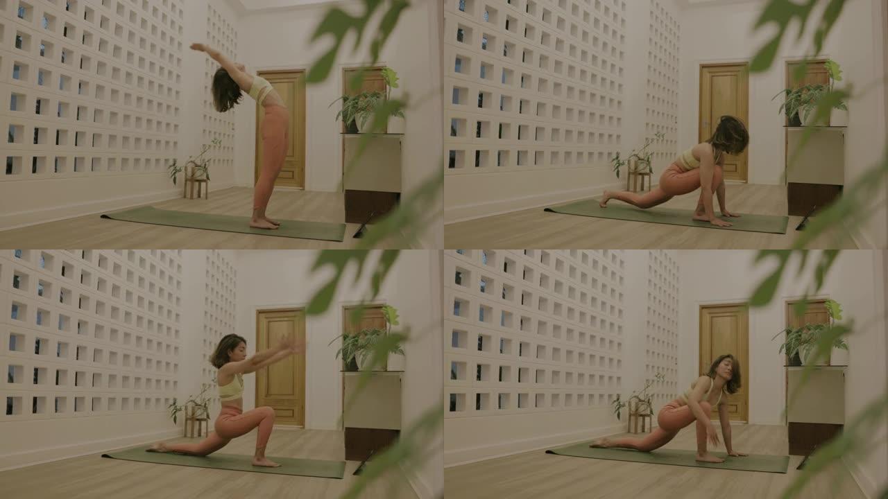 活跃的亚洲女性从办公室回家后在家做轻松的瑜伽。