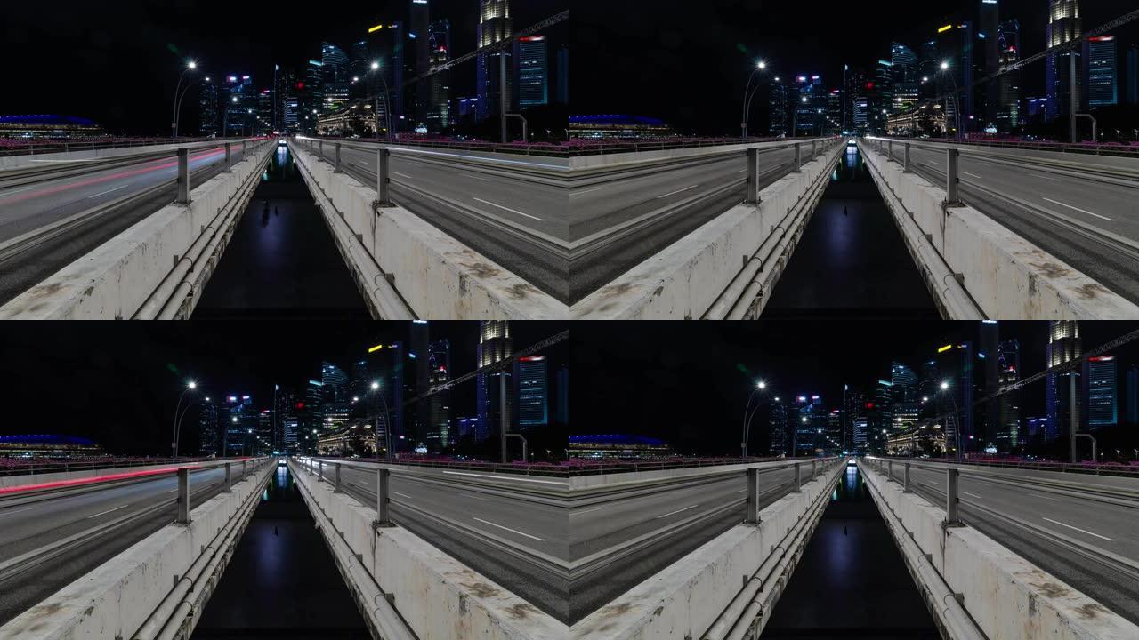 新加坡滨海湾大桥上的高速公路道路上的延时交通，以城市大都市高层摩天大楼的背景为背景。