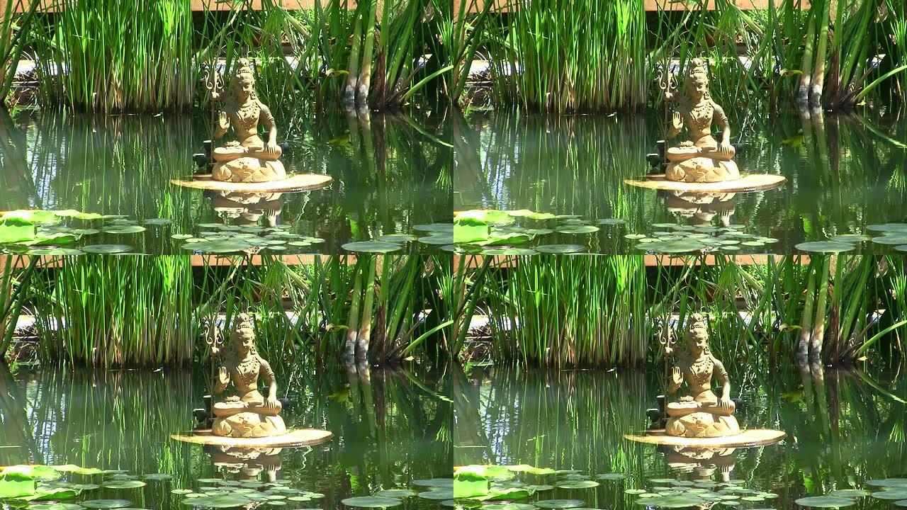池塘里的湿婆雕像