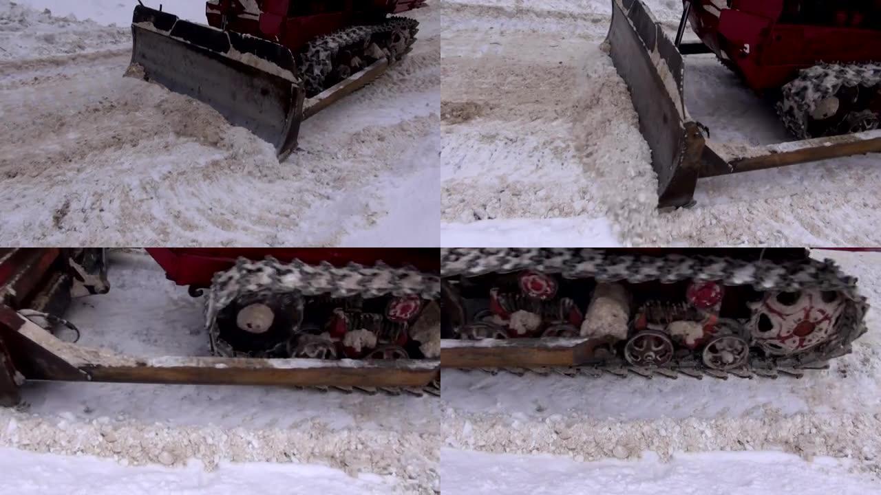 卡特彼勒拖拉机在有雪的道路上工作