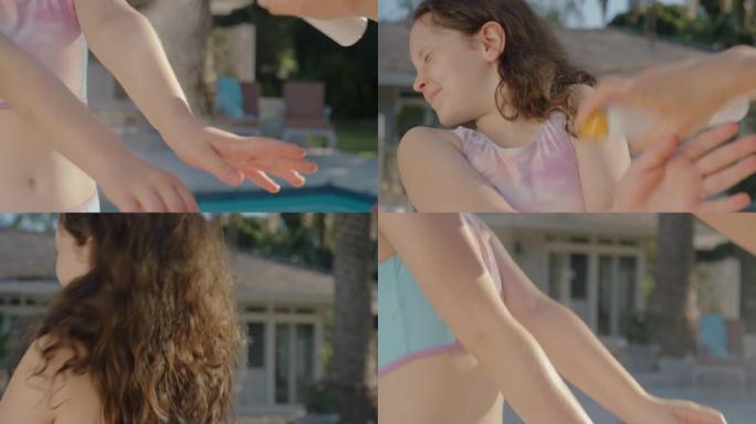 母亲在女儿皮肤上涂抹防晒霜以防晒小女孩准备在游泳池游泳，妈妈在阳光明媚的日子喷洒防晒霜照顾孩子的健康