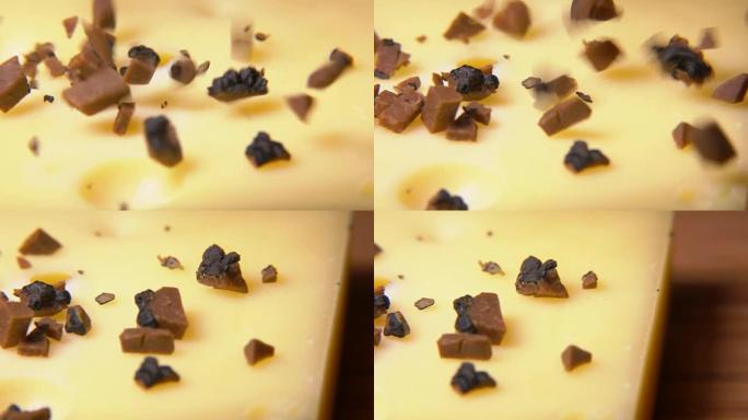 黑松露的立方体落在硬奶酪上
