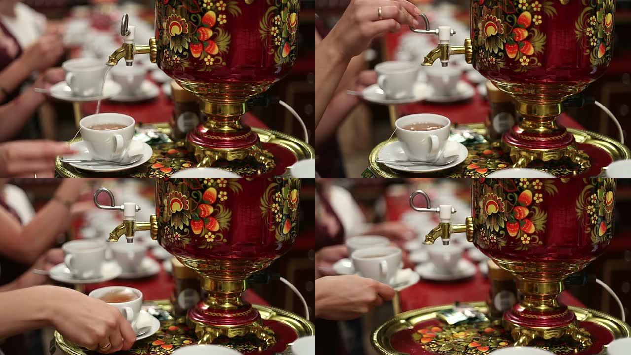 女人将茶炊中的沸水倒入杯子中