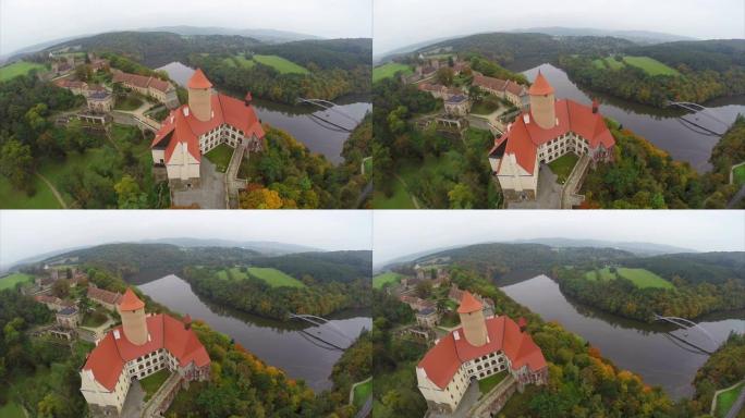 捷克共和国的红色屋顶城堡，土地领主几个世纪的空中。美丽的空中拍摄欧洲，文化和风景，相机在空中平移。无