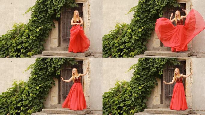 穿着时尚红色连衣裙的美丽年轻女子