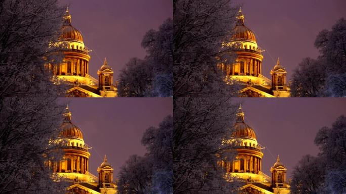 圣以撒大教堂的上部和冲天炉在冬天的夜晚被照亮