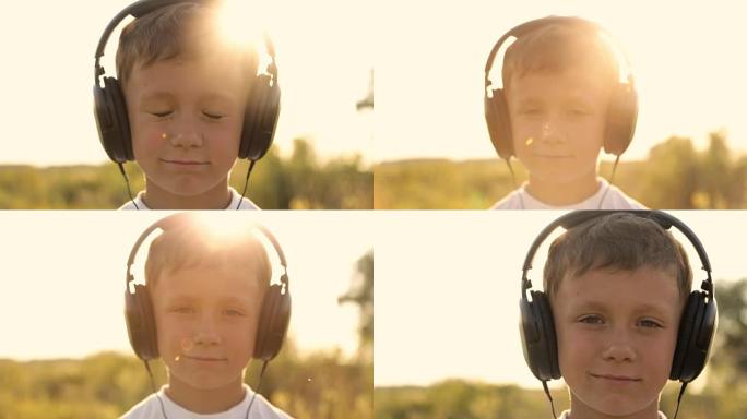 男孩在夕阳下的大自然中通过耳机听音乐
