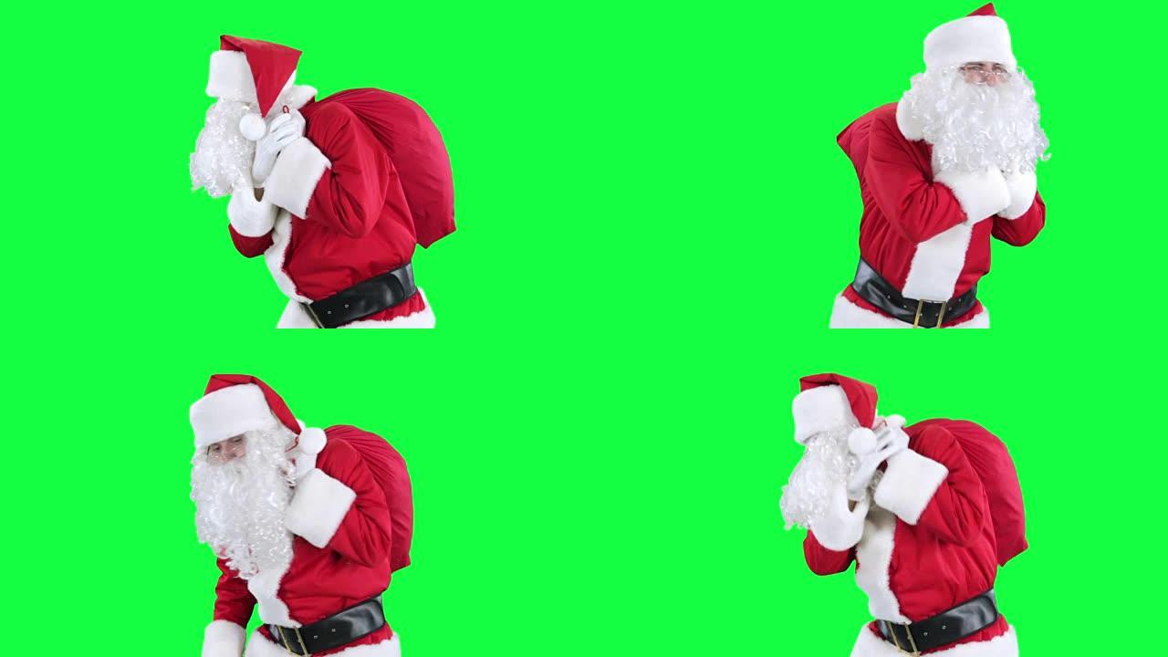 带礼品袋色度键的圣诞老人 (绿屏)