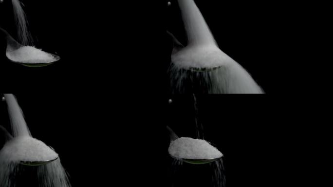 盐倒入汤匙中