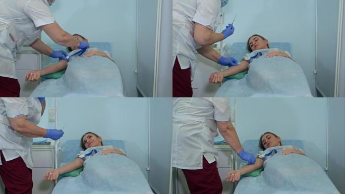 熟练的护士将滴管放在躺在病床上的女患者身上