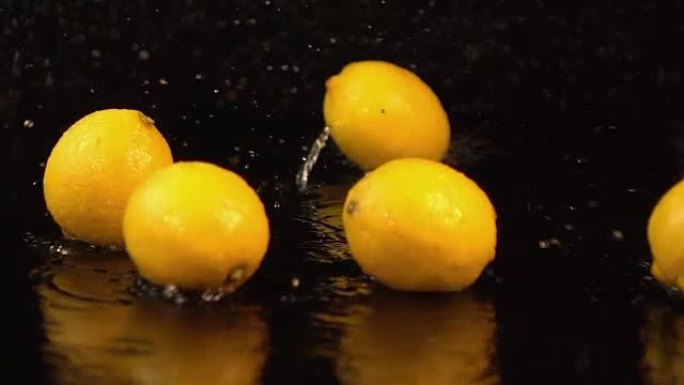 真实慢动作中掉落柠檬的四个视频