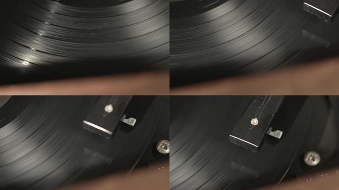 在播放器上旋转的黑胶唱片的特写镜头上平移
