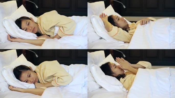 视频担心亚洲妇女在床上，失眠和对生活的思考